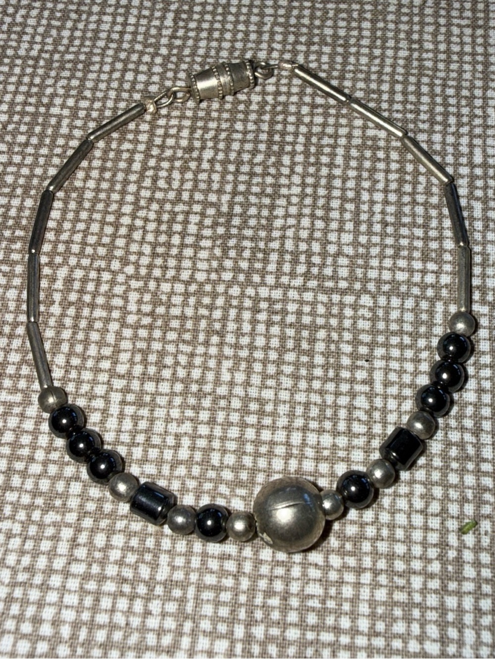 Hematite and Silver Tone Bracelet w/Round & Tunnel Beads 6.5 inch Barrel Clasp